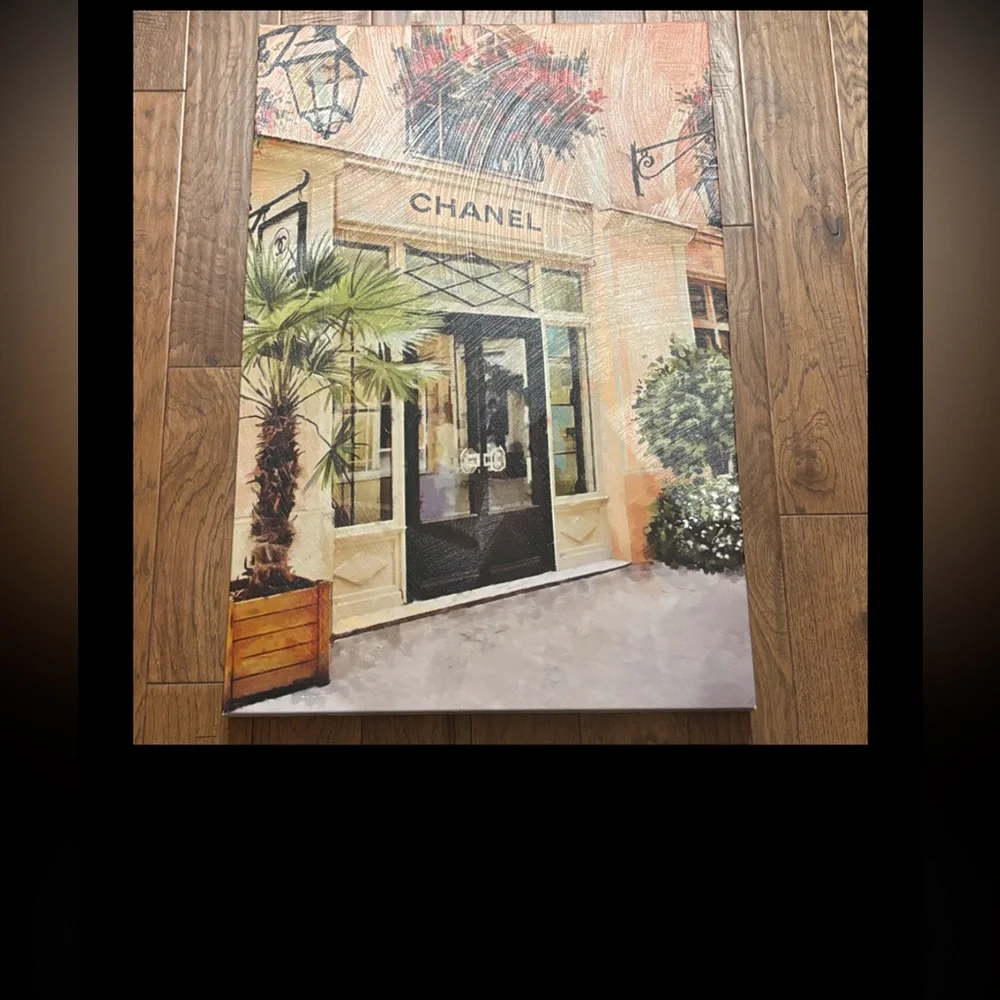CHANEL Elegant Storefront Canvas with Green and Black Accents